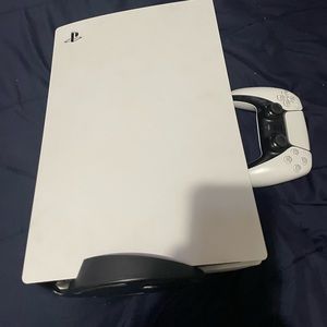 Selling Ps5 with controller also God of war included